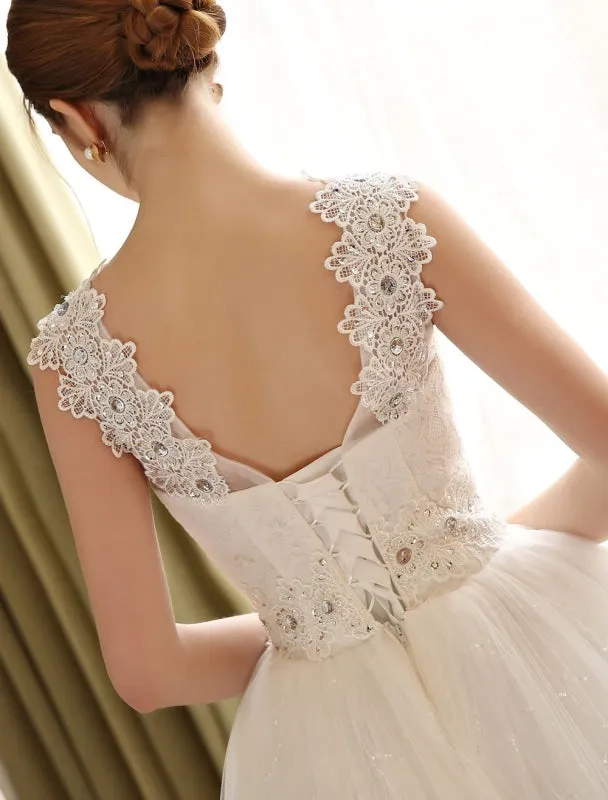 Princess Ball Gown Wedding Dresses Lace Applique Backless Beaded Sash Sequin Floor Length Ivory Bridal Dress